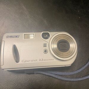 Sony Cyber-shot 3.2 MP Digital Camera - Silver with Blue Strap